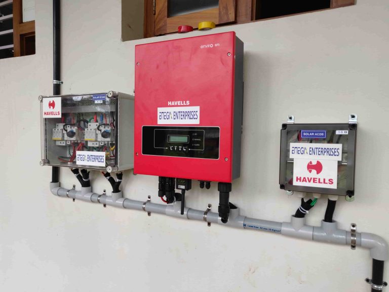 Wall-mounted solar inverter with electrical protection boxes and cabling